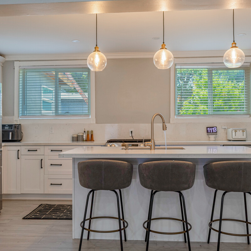 Modern kitchen with island and pendant lights